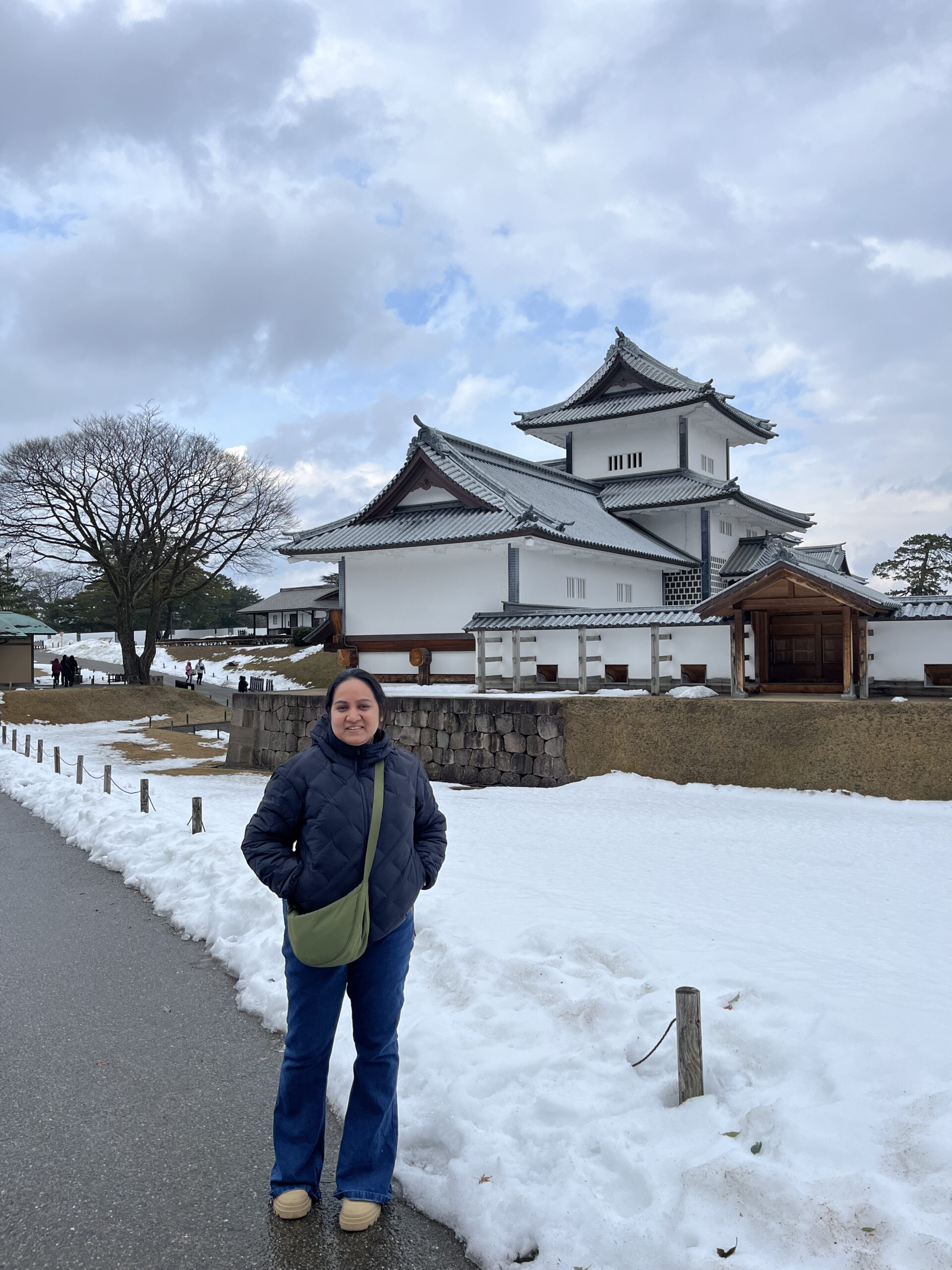Kanazawa Castle in winter with snow-covered grounds — Maeda clan headquarters during the Edo period